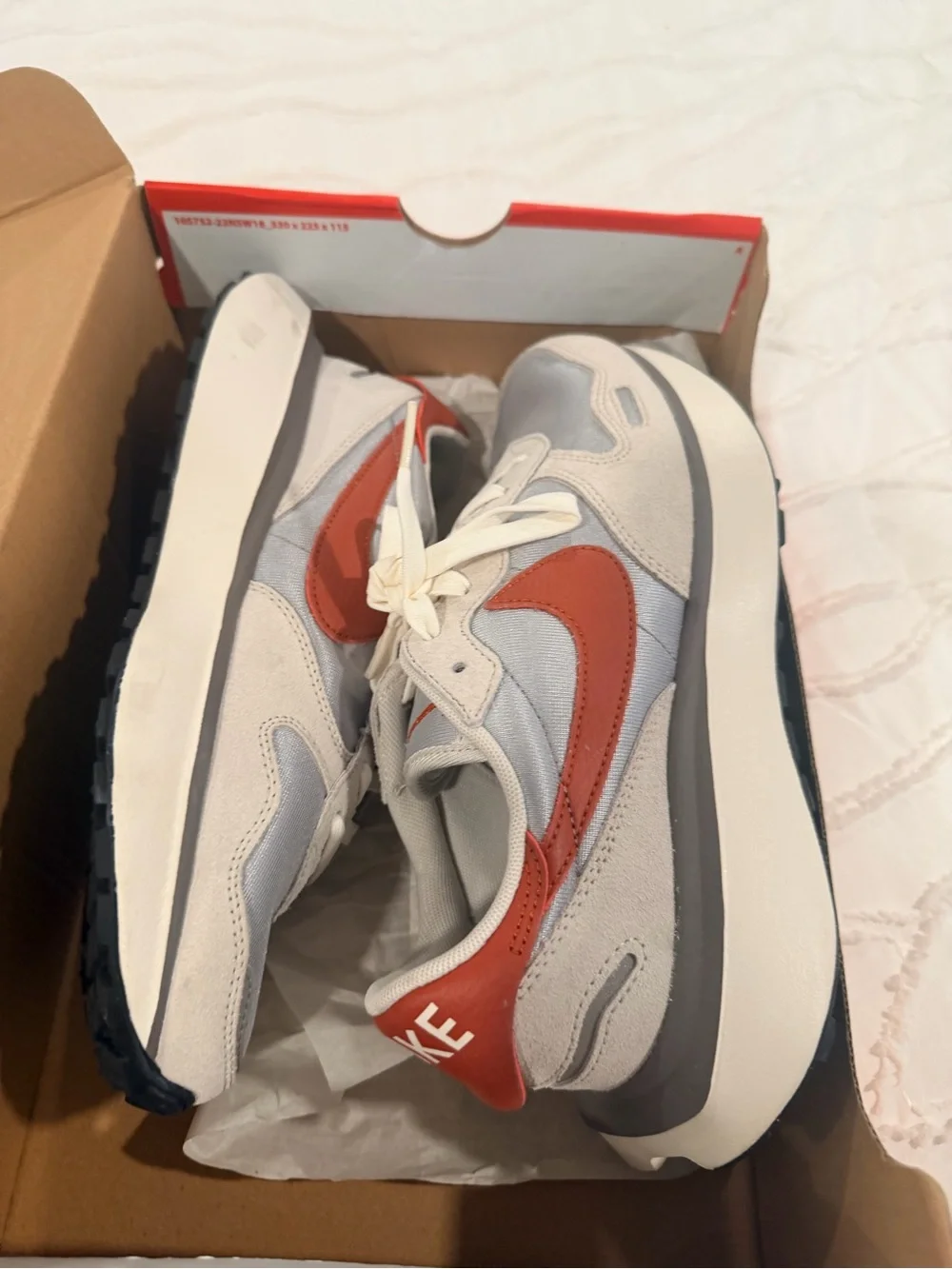 Nike woman’s gray and Red Retro-Style Running Sneakers